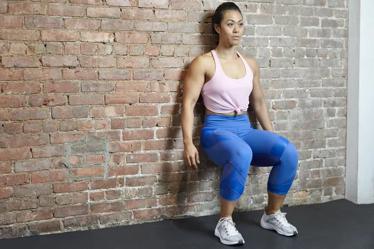 How to Do a Wall Sit: Proper Form, Variations, & Common Mistakes